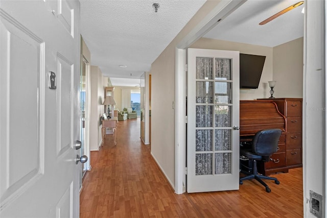7892 Sailboat Key Blvd S Unit 408, South Pasadena, FL 33707 - office area featuring wood finished floors and ceiling fan
