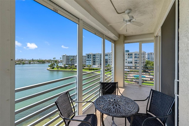 7892 Sailboat Key Blvd S Unit 408, South Pasadena, FL 33707 - balcony with a water view and a ceiling fan