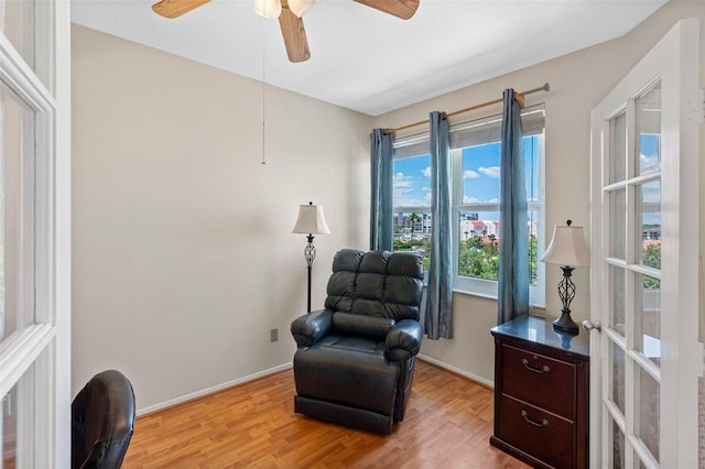 7892 Sailboat Key Blvd S Unit 408, South Pasadena, FL 33707 - sitting room featuring light wood finished floors and ceiling fan