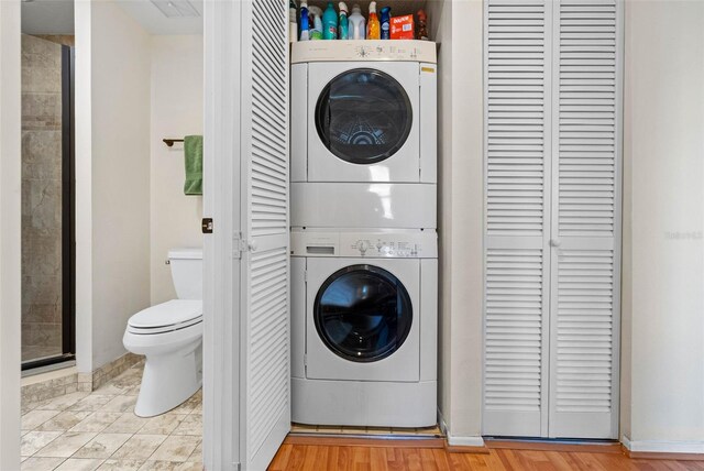 7892 Sailboat Key Blvd S Unit 408, South Pasadena, FL 33707 - laundry area with stacked washing machine and dryer