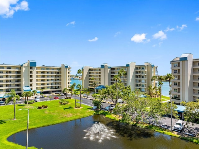 7892 Sailboat Key Blvd S Unit 408, South Pasadena, FL 33707 - surrounding community with a water view and uncovered parking
