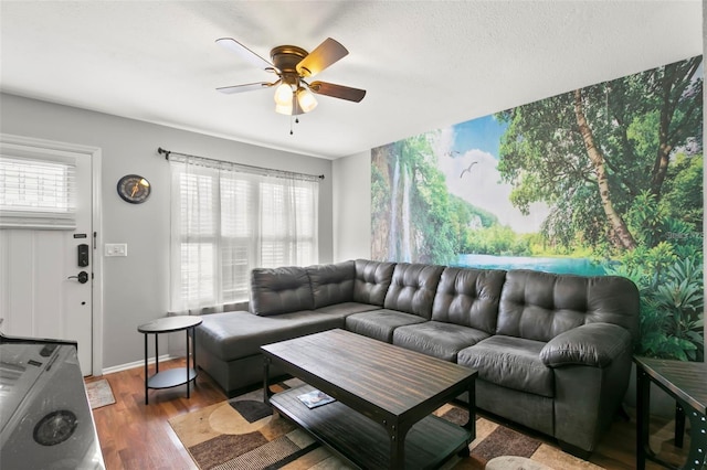 6681 121st Ave Unit I, Largo, FL 33773 - living area with a ceiling fan and wood finished floors