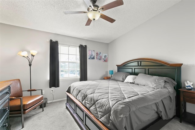 6681 121st Ave Unit I, Largo, FL 33773 - bedroom with light carpet, a textured ceiling, and ceiling fan
