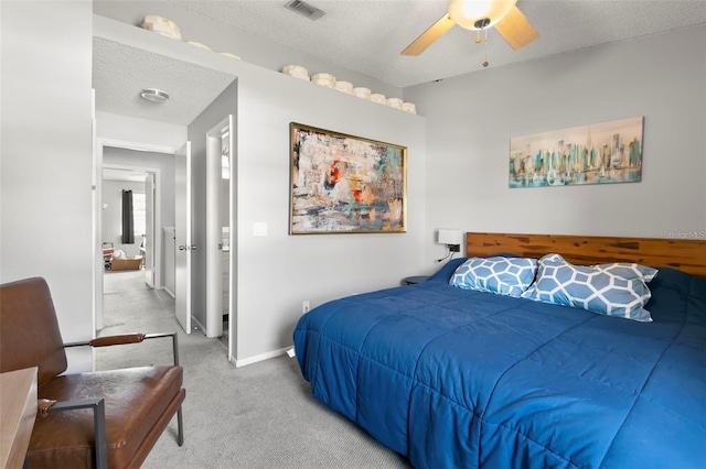 6681 121st Ave Unit I, Largo, FL 33773 - carpeted bedroom with a ceiling fan and a textured ceiling