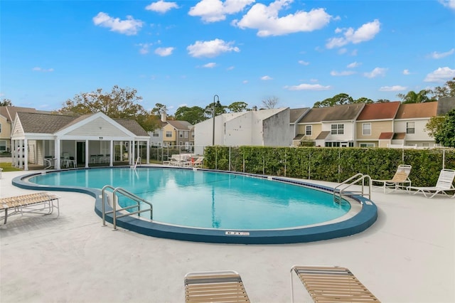 6681 121st Ave Unit I, Largo, FL 33773 - community pool with a residential view and a patio