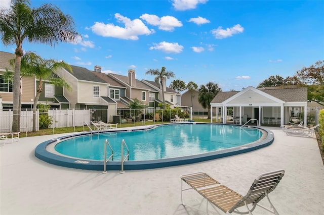 6681 121st Ave Unit I, Largo, FL 33773 - community pool with a residential view and a patio