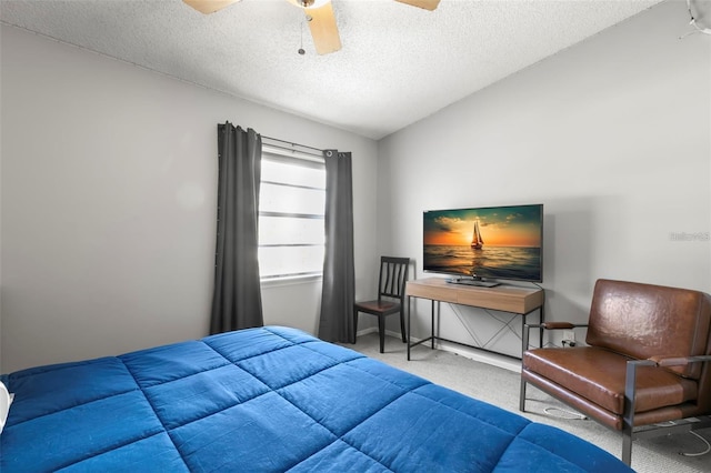 6681 121st Ave Unit I, Largo, FL 33773 - carpeted bedroom featuring a textured ceiling, lofted ceiling, and ceiling fan