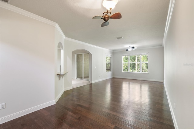 4920 Anniston Cir, Tampa, FL 33647 - unfurnished room with ceiling fan, arched walkways, crown molding, and wood finished floors