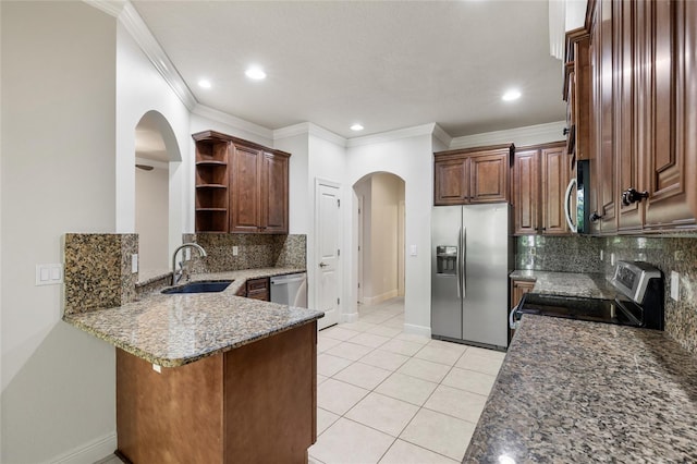 4920 Anniston Cir, Tampa, FL 33647 - kitchen featuring stainless steel appliances, arched walkways, open shelves, stone counters, and a peninsula