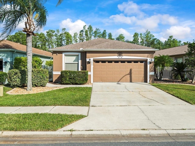 7606 Berna Ln, Land O Lakes, FL 34637 - ranch-style house featuring stucco siding, an attached garage, concrete driveway, and roof with shingles