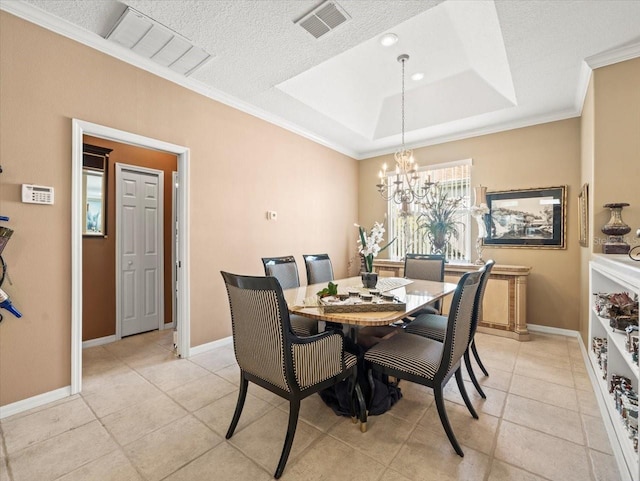 7606 Berna Ln, Land O Lakes, FL 34637 - dining space featuring a chandelier, a tray ceiling, ornamental molding, and light tile patterned floors