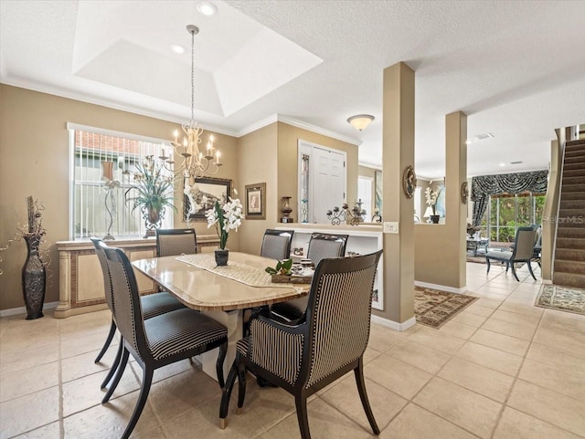 7606 Berna Ln, Land O Lakes, FL 34637 - dining area with a chandelier, a raised ceiling, ornamental molding, stairway, and light tile patterned flooring