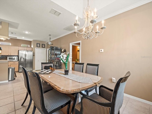 7606 Berna Ln, Land O Lakes, FL 34637 - dining space featuring a chandelier, light tile patterned floors, and crown molding