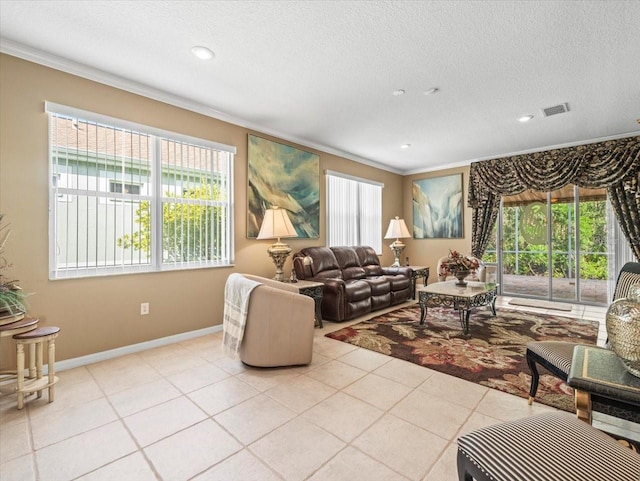 7606 Berna Ln, Land O Lakes, FL 34637 - living area with ornamental molding, a textured ceiling, light tile patterned flooring, and recessed lighting