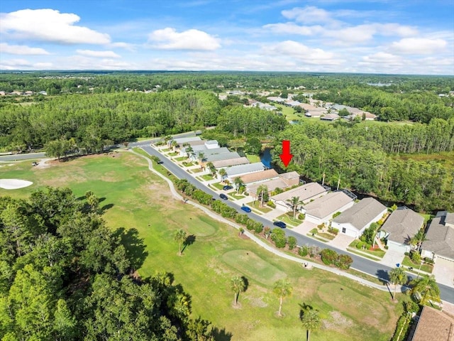 7606 Berna Ln, Land O Lakes, FL 34637 - aerial view of property and surrounding area featuring a local golf course and nearby suburban area