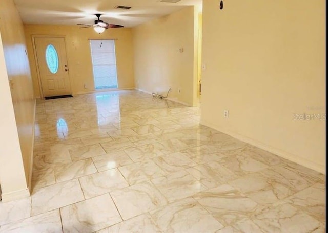 1918 Crown Park Dr, Valrico, FL 33594 - foyer entrance featuring light marble finish floors and a ceiling fan