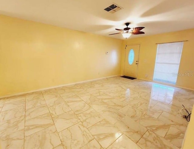 1918 Crown Park Dr, Valrico, FL 33594 - foyer entrance featuring ceiling fan and light marble finish floors