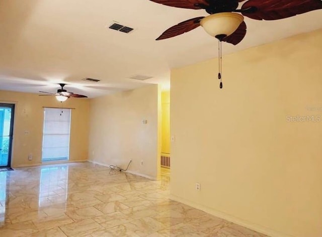 1918 Crown Park Dr, Valrico, FL 33594 - unfurnished room with ceiling fan and light marble finish floors