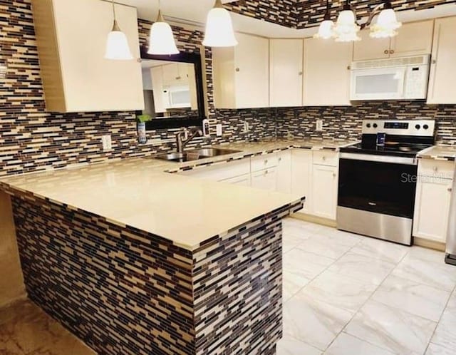 1918 Crown Park Dr, Valrico, FL 33594 - kitchen featuring white microwave, stainless steel electric stove, light countertops, a peninsula, and backsplash