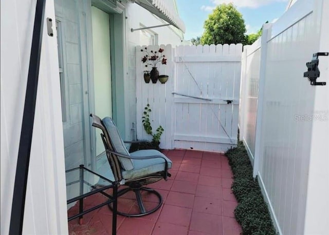 1918 Crown Park Dr, Valrico, FL 33594 - view of patio featuring a gate