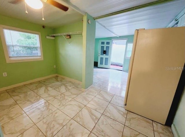 1918 Crown Park Dr, Valrico, FL 33594 - empty room with marble finish flooring and ceiling fan