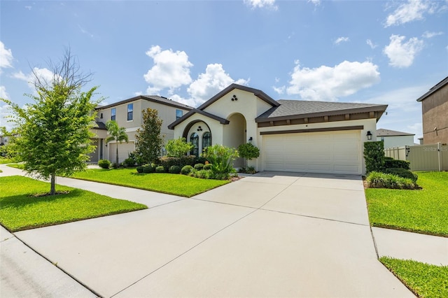 12652 Shetland Walk Dr, Lithia, FL 33547 - view of front of house featuring stucco siding, an attached garage, and driveway
