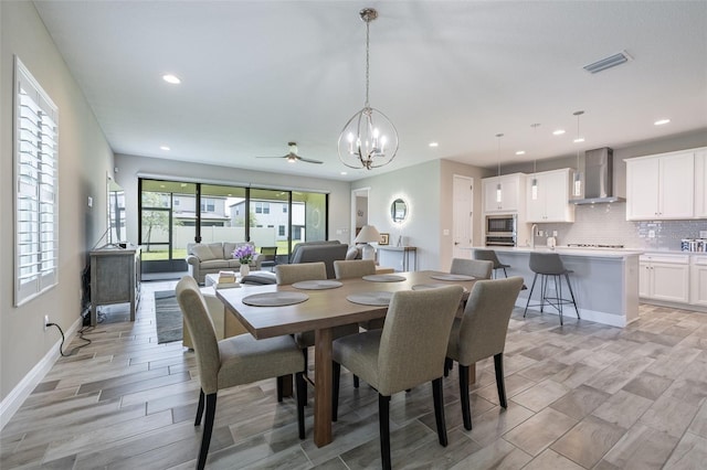 12652 Shetland Walk Dr, Lithia, FL 33547 - dining space with a chandelier, recessed lighting, and ceiling fan