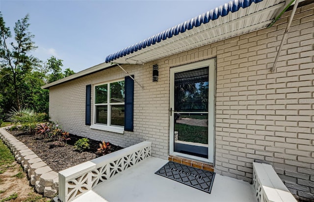 7332 Janczlik Dr, New Port Richey, FL 34652 - property entrance with brick siding