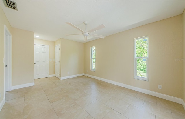 7332 Janczlik Dr, New Port Richey, FL 34652 - unfurnished room featuring ceiling fan and light tile patterned floors