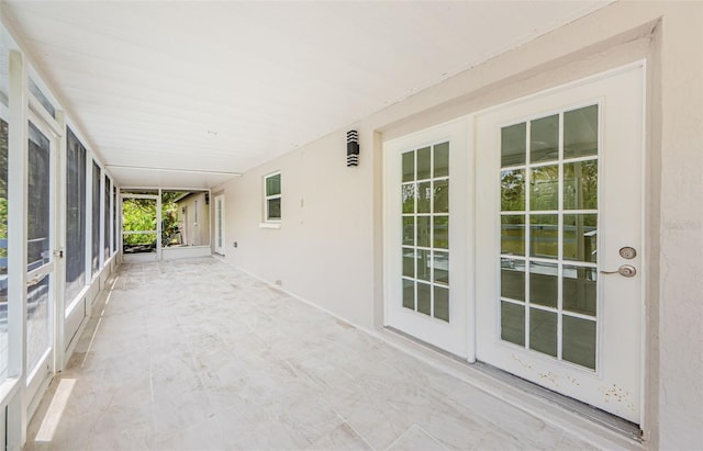7332 Janczlik Dr, New Port Richey, FL 34652 - unfurnished sunroom featuring french doors