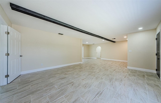 7332 Janczlik Dr, New Port Richey, FL 34652 - unfurnished living room with arched walkways and recessed lighting