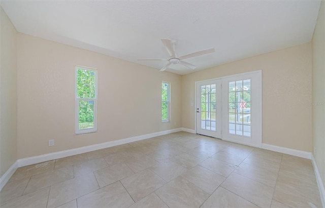 7332 Janczlik Dr, New Port Richey, FL 34652 - empty room with plenty of natural light, ceiling fan, and light tile patterned floors