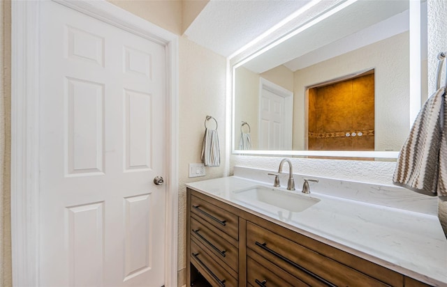 7332 Janczlik Dr, New Port Richey, FL 34652 - bathroom featuring vanity and a textured wall