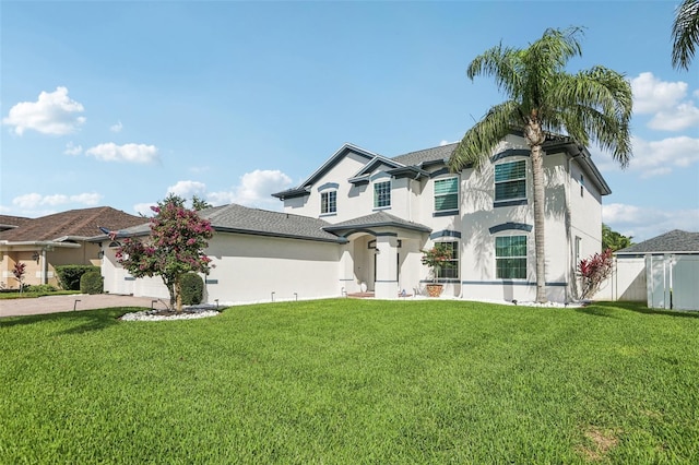 1802 Regal Mist Loop, Trinity, FL 34655 - view of front of house with stucco siding, driveway, and a garage