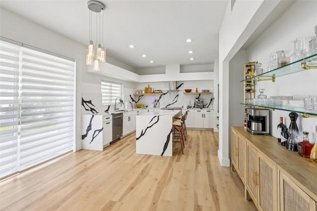 1802 Regal Mist Loop, Trinity, FL 34655 - exercise room featuring light wood-style floors, a bar, and recessed lighting