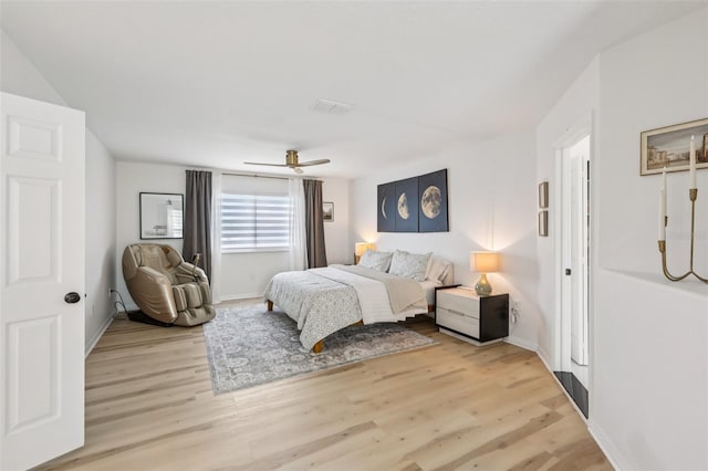 1802 Regal Mist Loop, Trinity, FL 34655 - bedroom featuring light wood-style flooring and ceiling fan