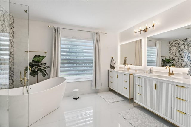 1802 Regal Mist Loop, Trinity, FL 34655 - full bathroom with vanity, a freestanding tub, and tile patterned floors