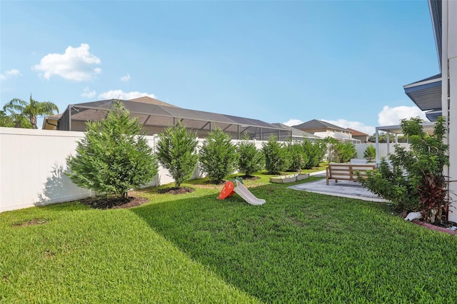 1802 Regal Mist Loop, Trinity, FL 34655 - fenced backyard featuring a patio