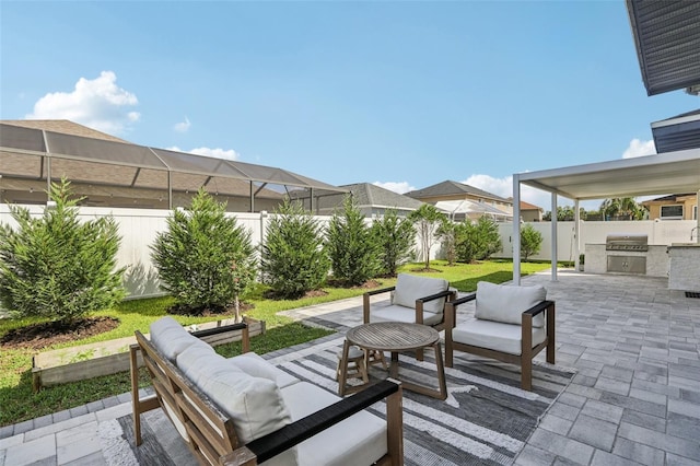 1802 Regal Mist Loop, Trinity, FL 34655 - fenced backyard with outdoor lounge area, an outdoor kitchen, a patio, and a residential view