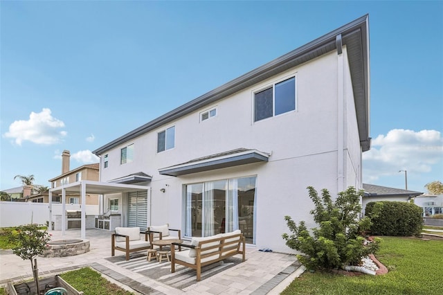 1802 Regal Mist Loop, Trinity, FL 34655 - rear view of property with a patio area, stucco siding, and an outdoor hangout area