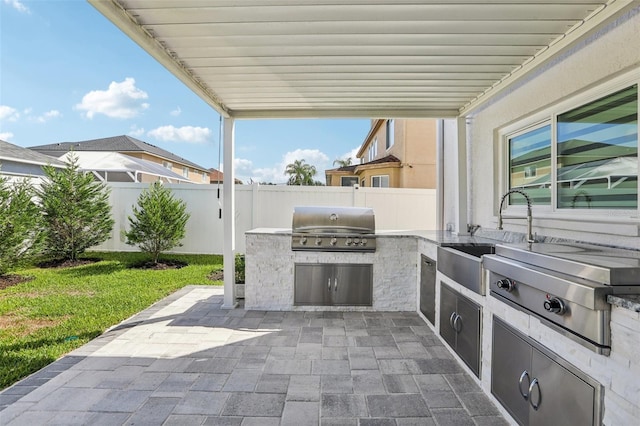 1802 Regal Mist Loop, Trinity, FL 34655 - view of patio featuring area for grilling and a sink