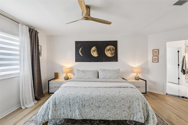1802 Regal Mist Loop, Trinity, FL 34655 - bedroom featuring wood finished floors and ceiling fan
