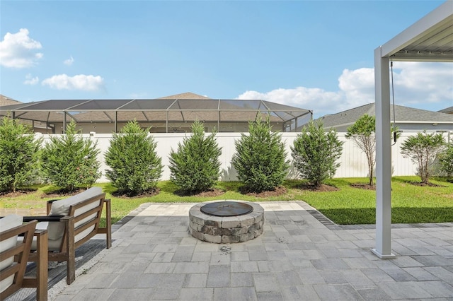 1802 Regal Mist Loop, Trinity, FL 34655 - fenced backyard featuring an outdoor fire pit and a patio area