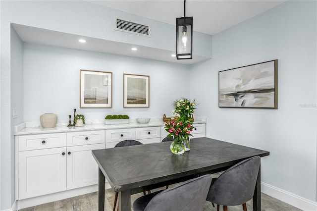 10520 White Lake Ct Unit 10520, Tampa, FL 33626 - dining space featuring light wood-style floors and recessed lighting