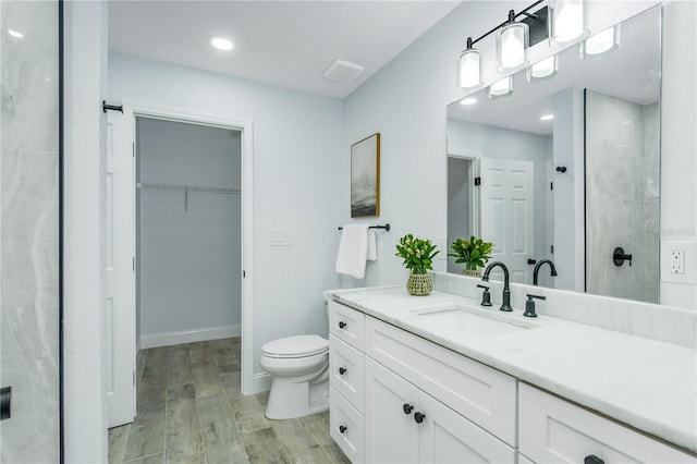 10520 White Lake Ct Unit 10520, Tampa, FL 33626 - full bath featuring vanity, wood finished floors, a spacious closet, and a shower