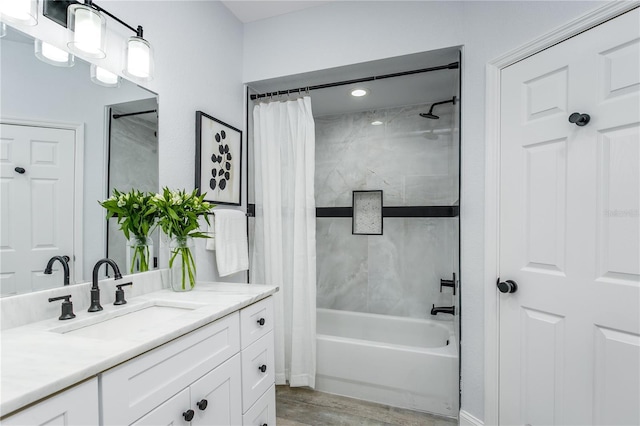 10520 White Lake Ct Unit 10520, Tampa, FL 33626 - bathroom with vanity, shower / tub combo, and wood finished floors