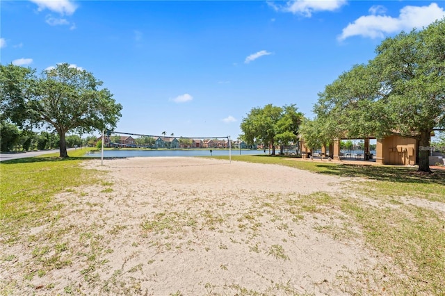 10520 White Lake Ct Unit 10520, Tampa, FL 33626 - view of community featuring volleyball court, a water view, and a yard