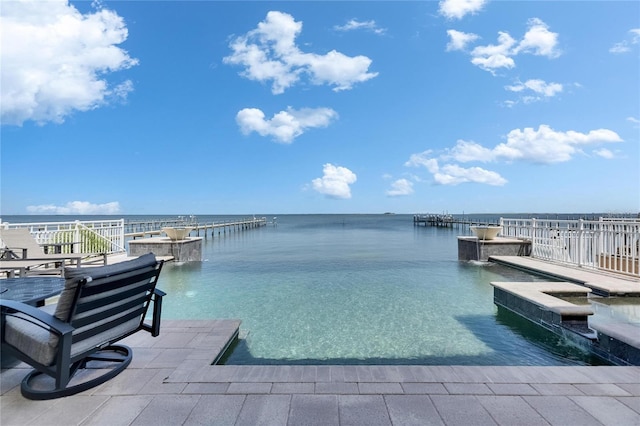 6418 Bright Bay Ct, Apollo Beach, FL 33572 - view of swimming pool featuring a water view