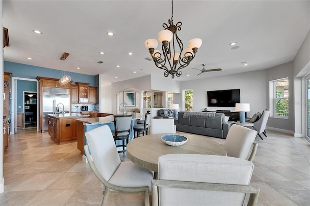 6418 Bright Bay Ct, Apollo Beach, FL 33572 - dining space featuring ceiling fan, recessed lighting, and a chandelier
