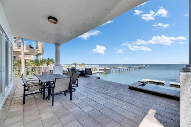 6418 Bright Bay Ct, Apollo Beach, FL 33572 - patio / terrace featuring a water view and outdoor dining area